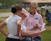 Caroline Adams and Gaby Collins review judge's comments with Jodie Kelly
