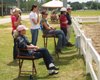 (L to R) Cindy Carpenter, Dawn Adams, Kristine Lundblad, Jennifer Boblitt, Lindsay Graham and Bob Graham watch as Jodie Kelly works Lindsay's Pandarus